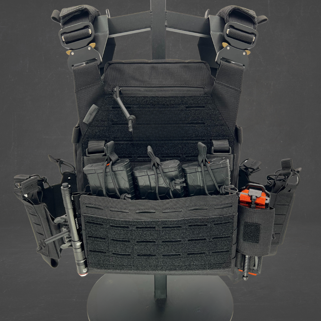 Invictus Pattern MK I Modular Plate Carrier displayed on a stand showcasing its modular design and tactical features.